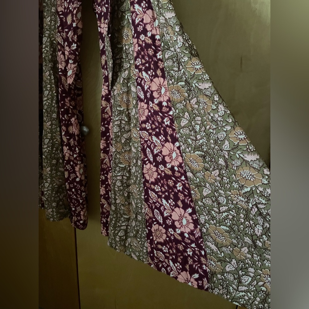 NWOT! Free People Bali Boho flare pants. Color multi reds and greens. Sizes: M,L - Picture 2 of 14